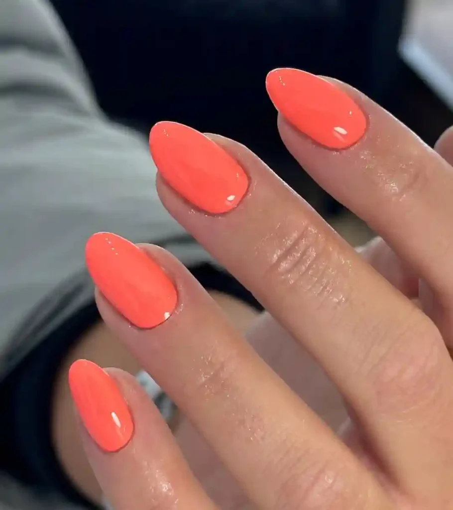 Bold Glossy Peach Coral Almond Nails
