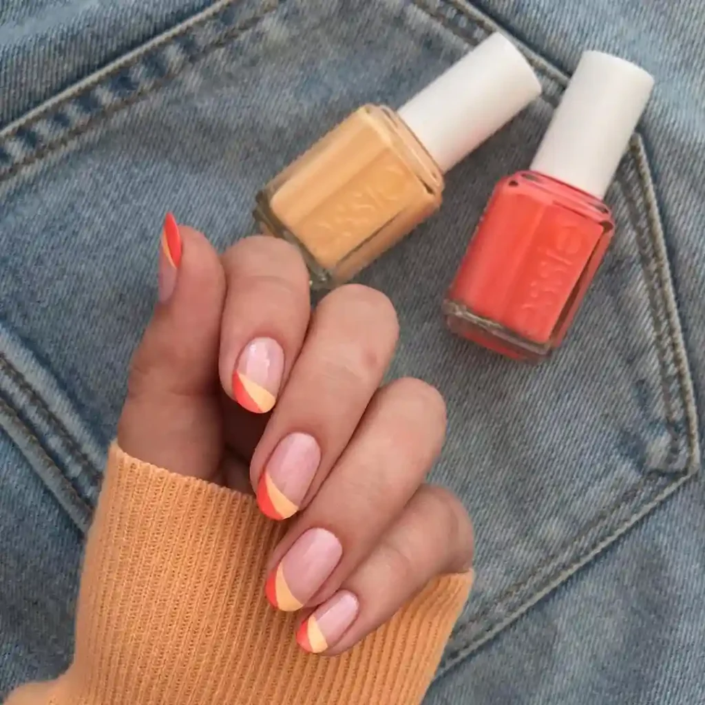 Coral Nails with Wavy Accent Art