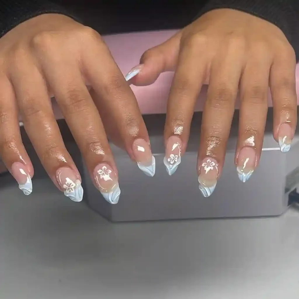 Light Blue Wavy French Tips With Floral Touch