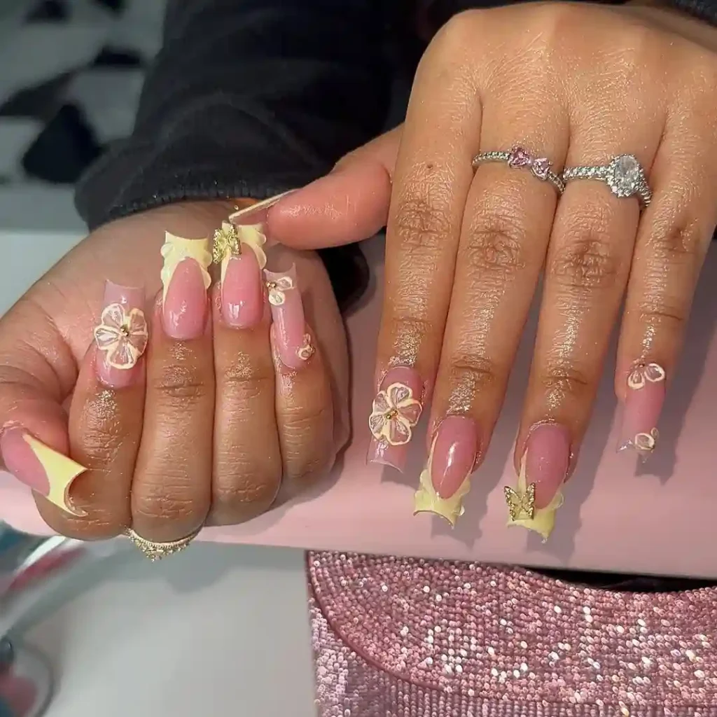 Nude Nails with Soft Yellow French and 3D Florals