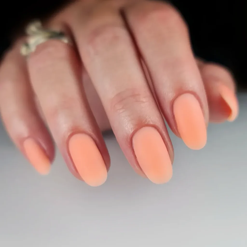 Subtle Peach Coral Chrome Sheen