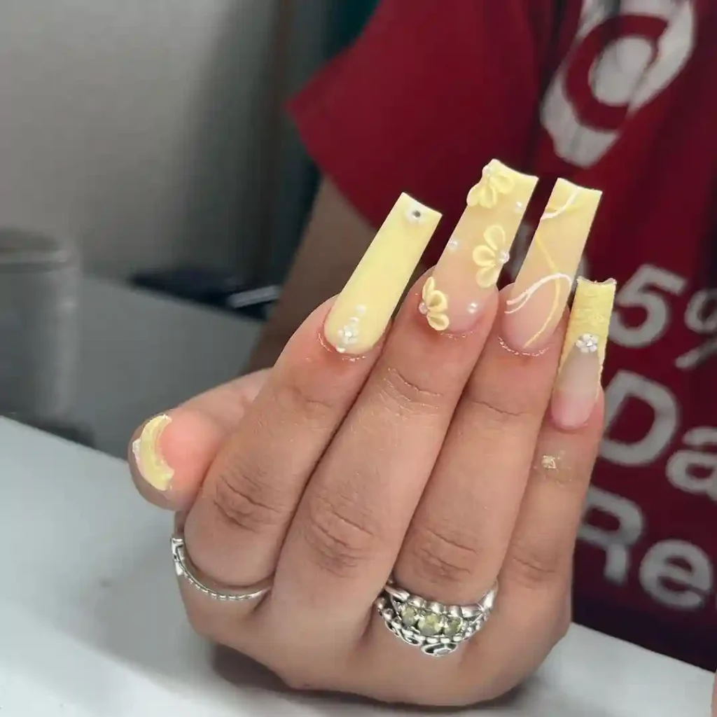 Yellow French Tips with Pink Flower Accents