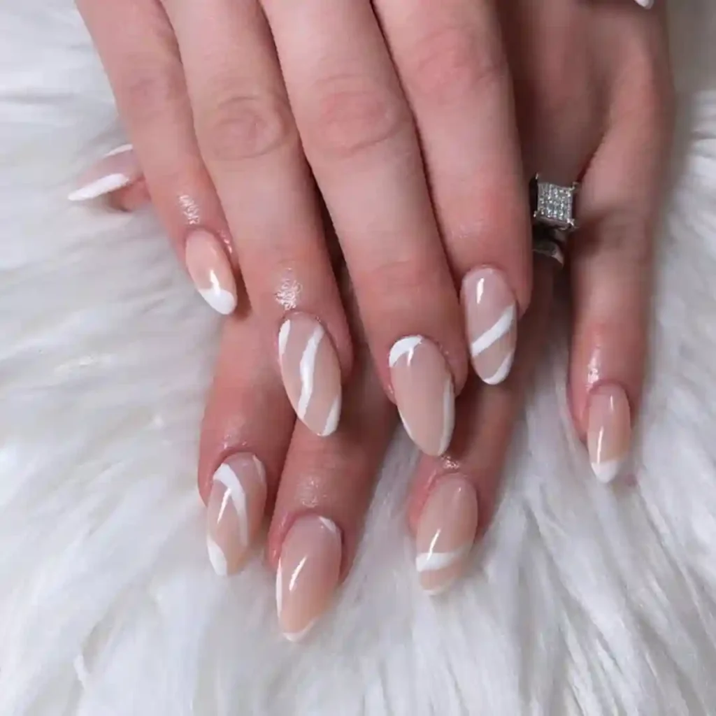 Almond White Swirl Tips on Nude Base