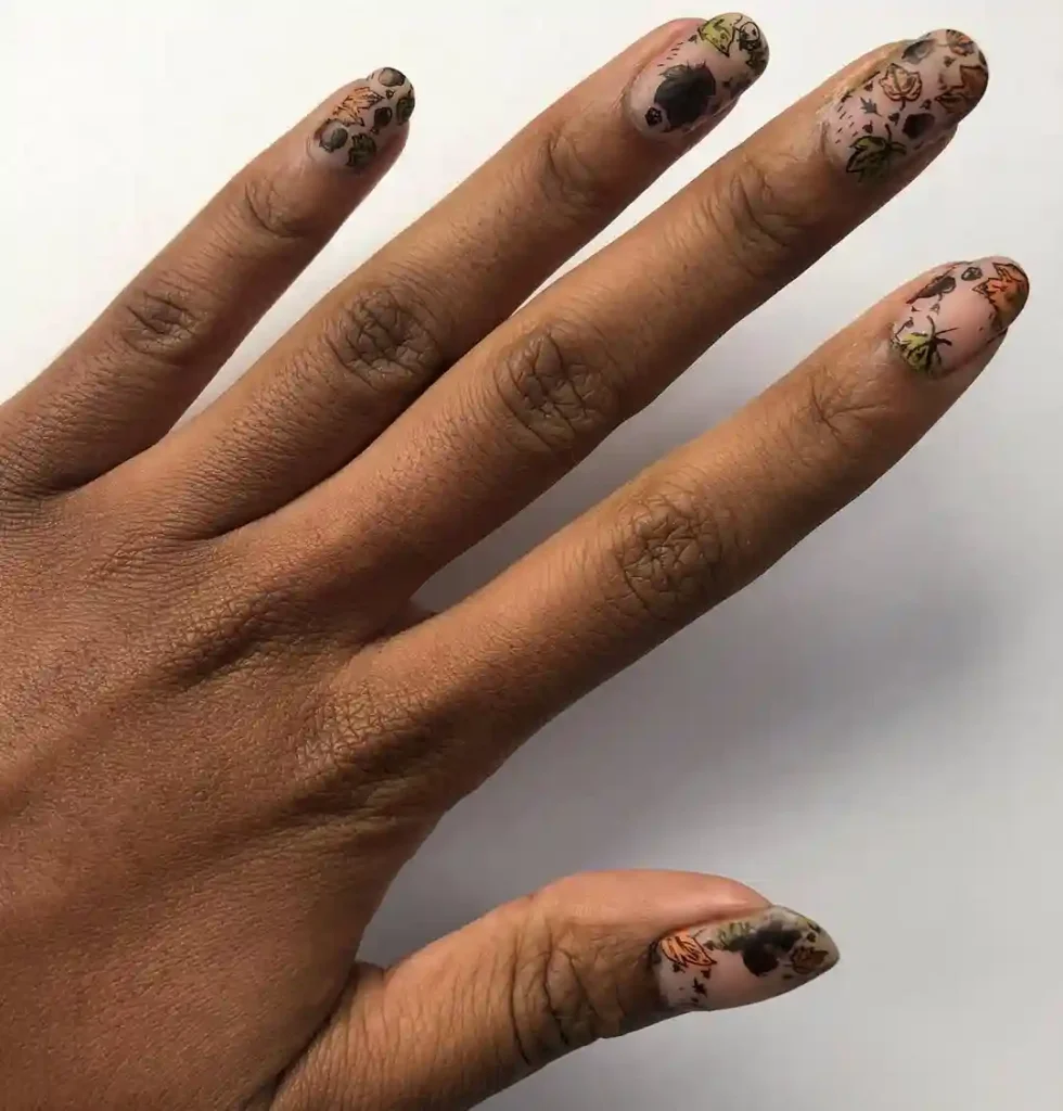 Autumn-Inspired Leaf Nail Art on a Neutral Base