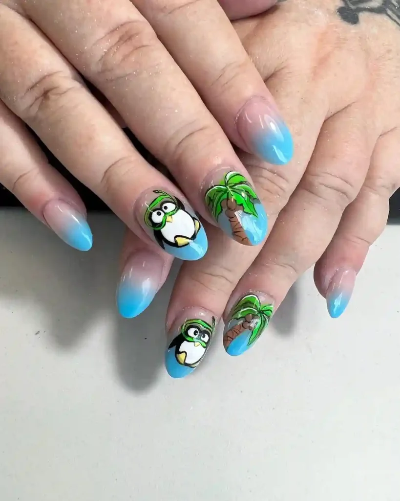 Cartoon Penguin and Palm Tree Nails for a Fun Beach Look
