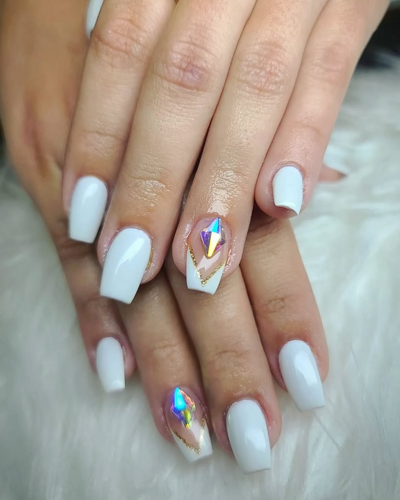 Glossy White Nails with 3D Gems and Gold Accents