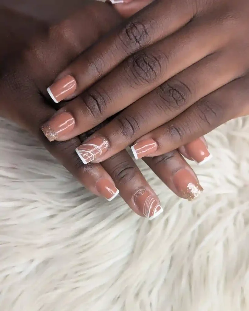 Nude and White French Tips with Glitter Accent
