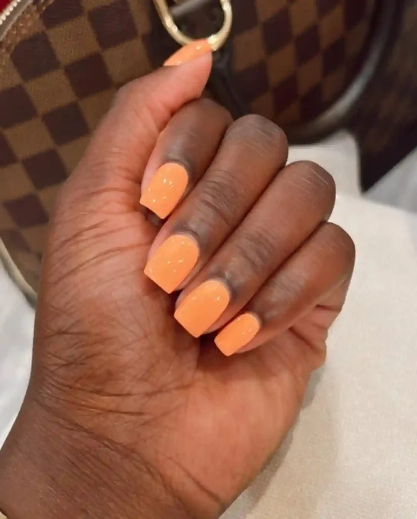 Peachy Sparkle Nails with a Hint of Glow