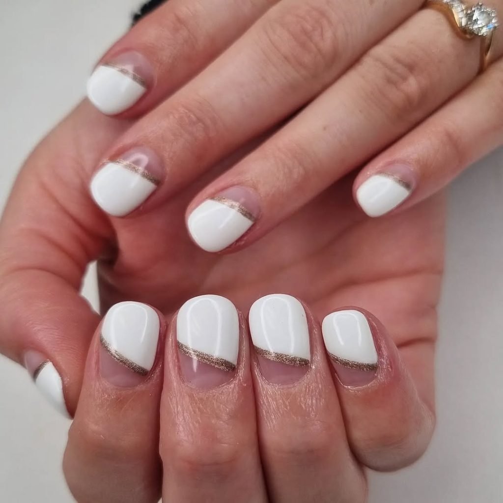 White Nails with Gold Diagonal Lines