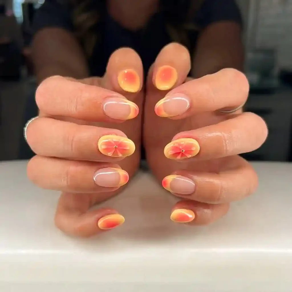 Yellow-Orange Aura Nails with Floral Accents